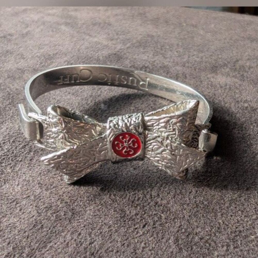 Rustic Cuff Silver Bow Bracelet with Red Accent